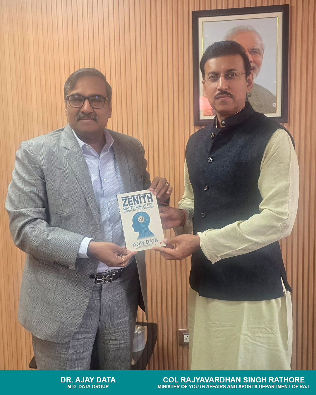 Dr. Ajay Data handing over the book titled 'Zenith' to the Honorable Col-Rajyavardhan-Singh-Rathore